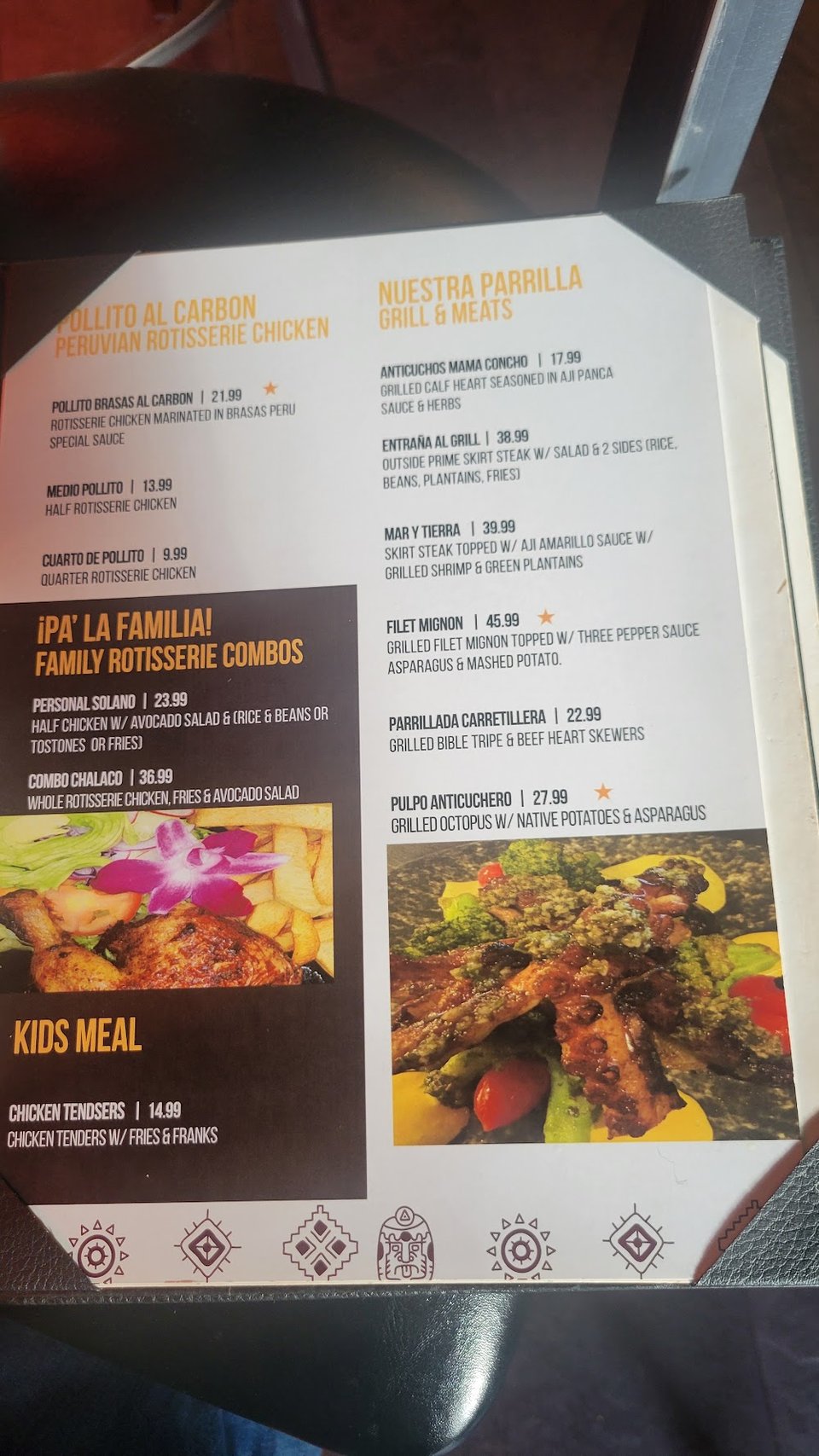 Menu board showing Peruvian dishes and starters.